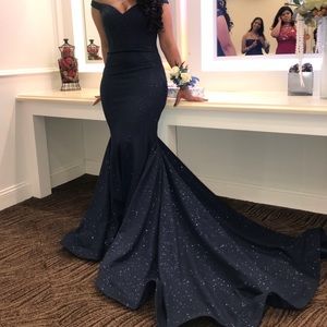 - A Jovani navy blue shiny dress